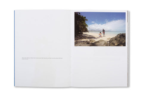 Open photography book "Hola Mi Amol" by SPBH Editions showing vibrant images and artistic photography pages.