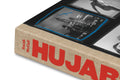 Close-up of the cover page of Hujar:Contact photography book by MACK, showcasing detailed cover art and design elements.