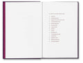 Open book titled "I Saw the Sun" by MACK, showing colorful sun illustrations on white pages.