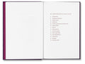 Open book titled "I Saw the Sun" by MACK, showing vibrant photography pages and artistic cover design.