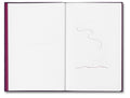 Open book titled "I Saw the Sun" by MACK, showing colorful pages and artistic photography inside.