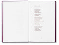 Open book titled "I Saw the Sun" by MACK showing vibrant sun illustrations on white pages.