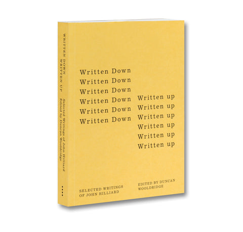 Cover of "Written Down / Written Up" book by John Hilliard, published by MACK, featuring abstract artwork and book title text.