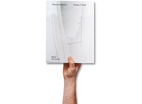 Open art book titled "House of Card" by MACK, featuring colorful abstract illustrations on glossy pages.